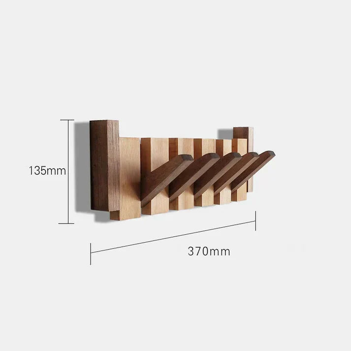 "Pianovormige houten kapstok met uniek design, vervaardigd uit hoogwaardig hout, geschikt voor jassen en accessoires."