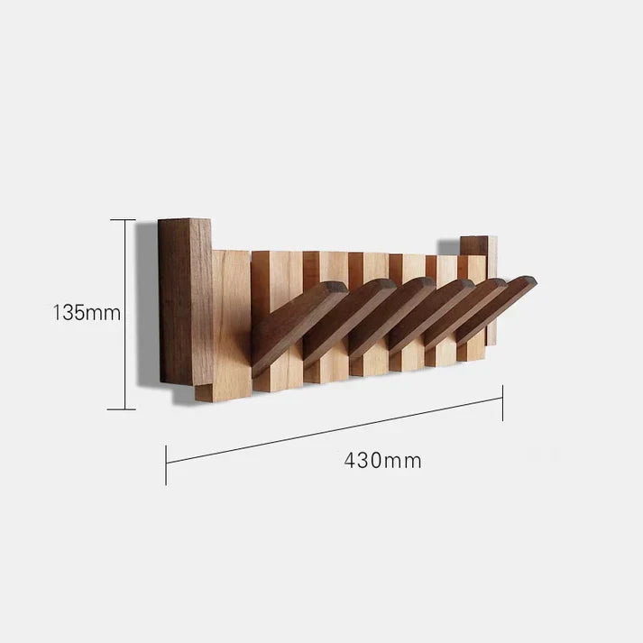 "Pianovormige houten kapstok met uniek design, vervaardigd uit hoogwaardig hout, geschikt voor jassen en accessoires."