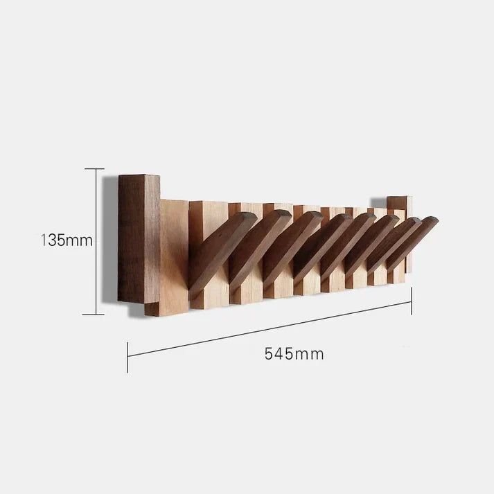 "Pianovormige houten kapstok met uniek design, vervaardigd uit hoogwaardig hout, geschikt voor jassen en accessoires."