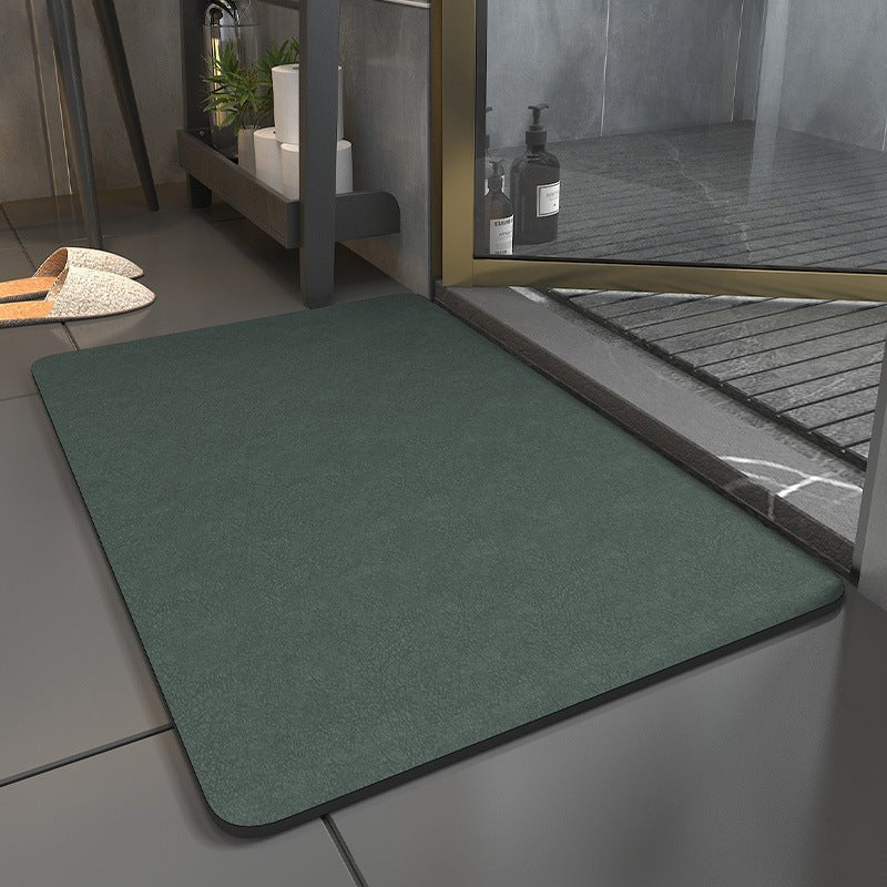 Snel drogende antislip badmat in lichtgrijs, absorberend textiel met zachte textuur voor veilige en hygiënische badkamer.