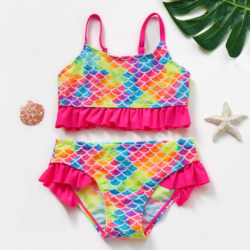 Sneldrogend kinderbikini set met kleurrijk design, ideaal voor strand of zwembad. Comfortabel, beschermend en speels.