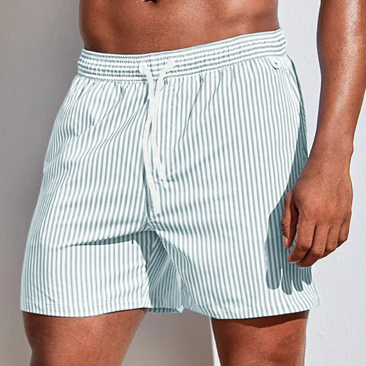"Sneldrogende heren board short, lichtblauw, elastische tailleband, stijlvolle strandkleding voor zomerse looks."