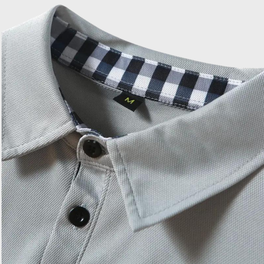 Stijlvol heren poloshirt met lange mouwen in marineblauw, zilvergrijs en zwart voor comfort en veelzijdige uitstraling.