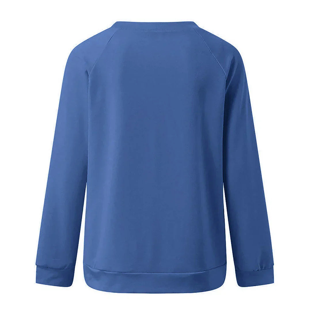 Stijlvolle Aria damestrui met 'Just Breathe' print, warme acrylstof, ronde hals, en lange mouwen voor comfort en stijl.