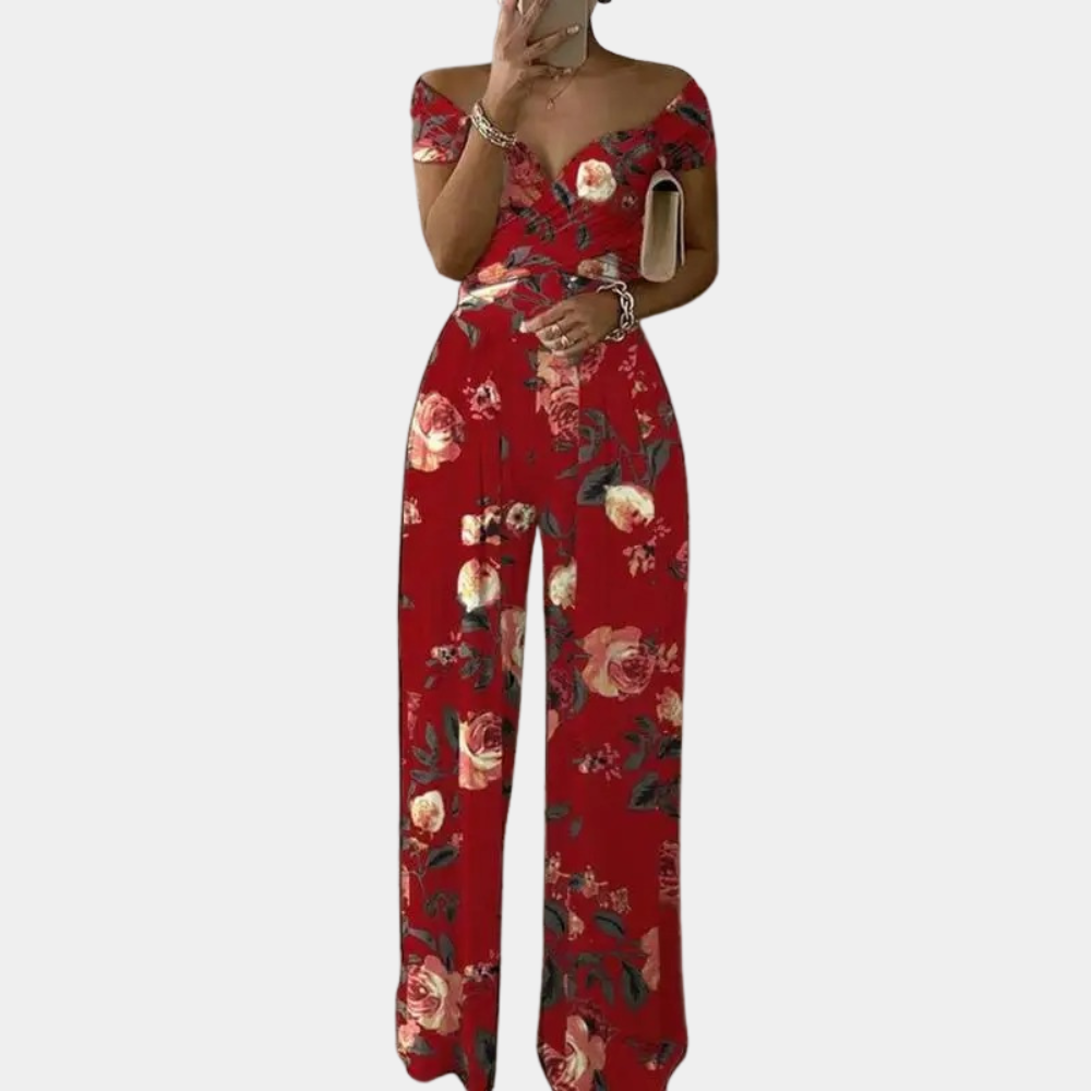 "Stijlvolle dames jumpsuit met blauwe print, elegante snit en stretchmateriaal voor comfortabele, flatterende pasvorm."
