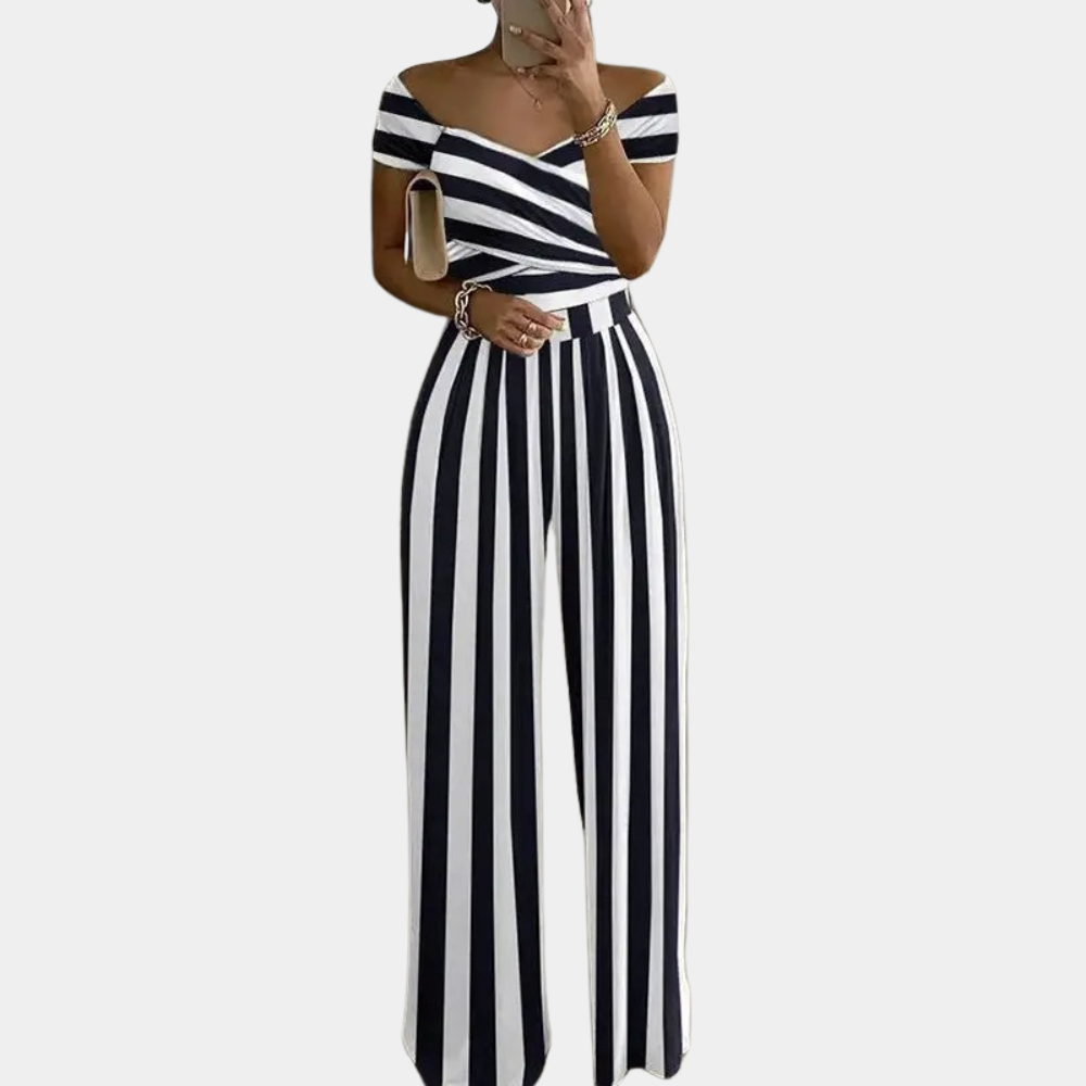 "Stijlvolle dames jumpsuit met blauwe print, elegante snit en stretchmateriaal voor comfortabele, flatterende pasvorm."