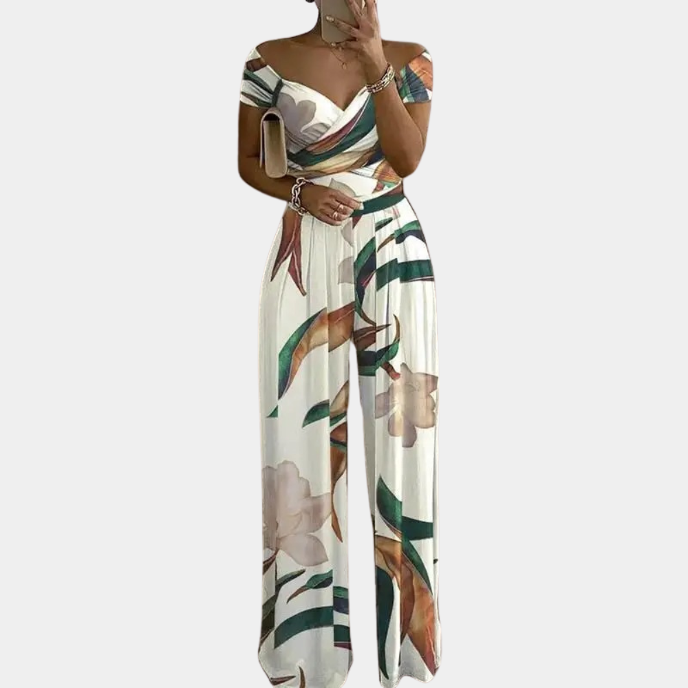 "Stijlvolle dames jumpsuit met blauwe print, elegante snit en stretchmateriaal voor comfortabele, flatterende pasvorm."
