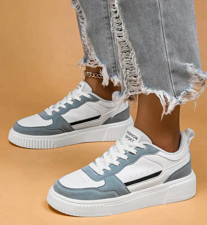 "Stijlvolle dames sneakers in zwart met wit. Modern design, ademende materialen en antislipzool bieden comfort en grip."