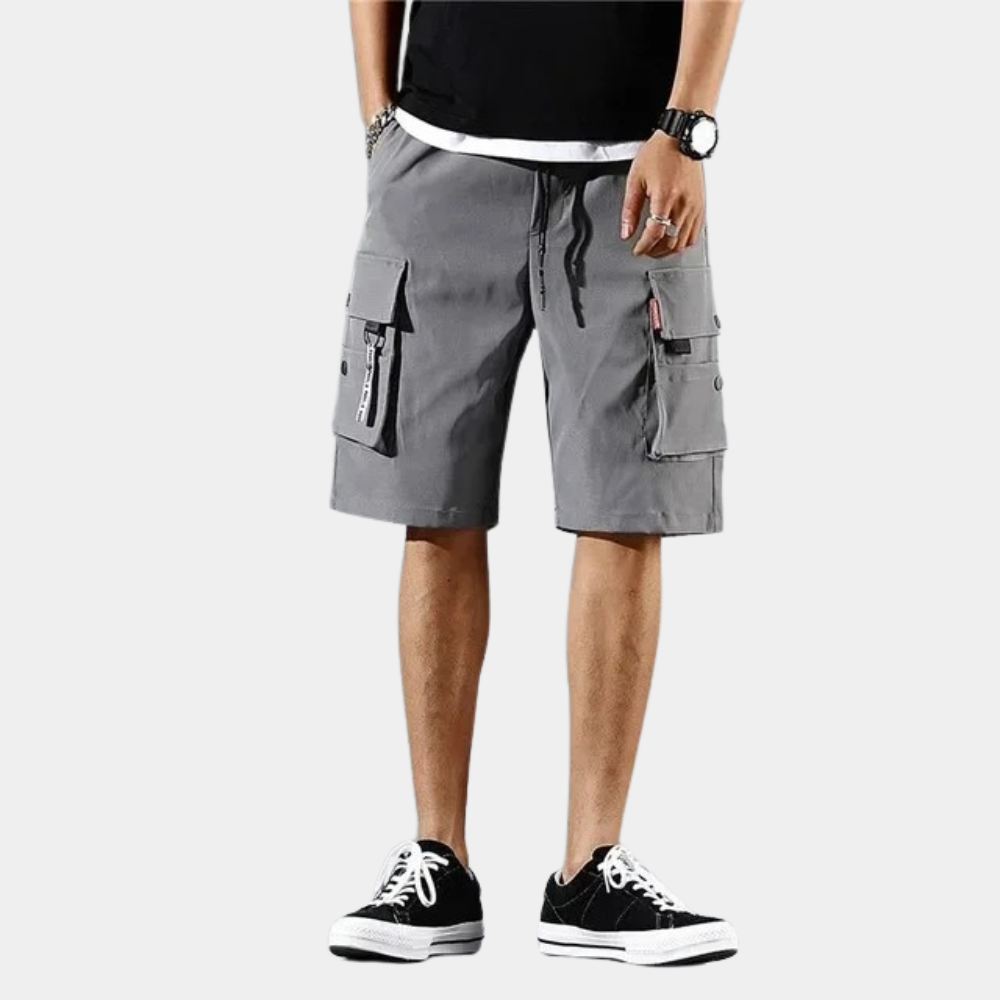 "Stijlvolle heren cargo shorts in grijs, khaki en zwart met praktische zakken, ideaal voor comfort en casual stijl."