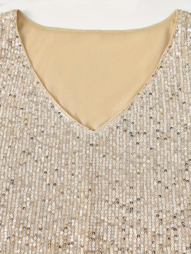 "Stijlvolle mouwloze paillettentop met V-hals, flatterende pasvorm en ademend materiaal voor zomerse elegantie."