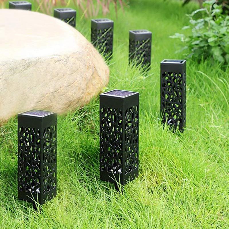 "Stijlvolle tuinlamp op zonne-energie, weerbestendig ontwerp, warme sfeerverlichting voor tuin zonder kabels."