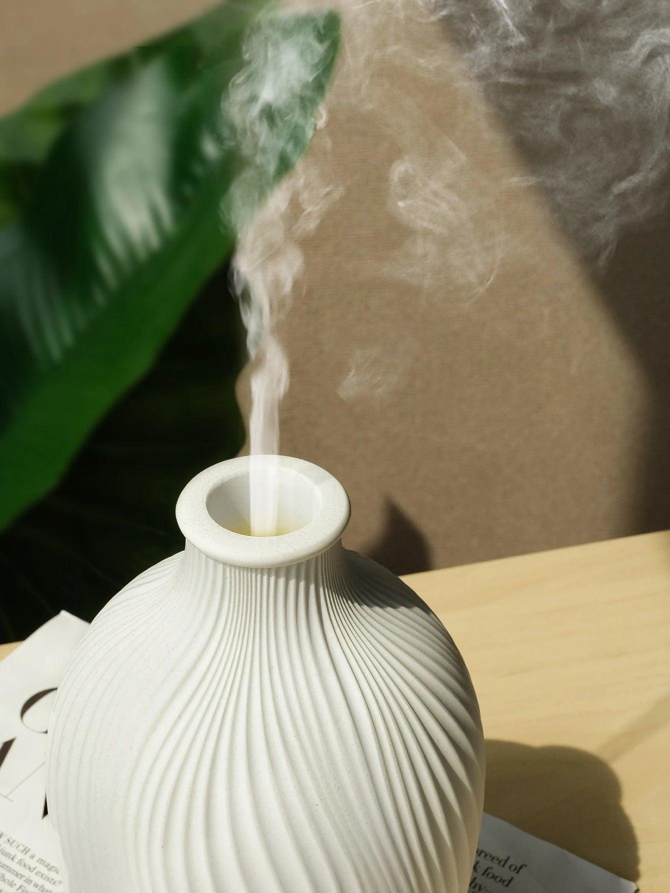 "Stijlvolle ultrasone aroma diffuser in vaasvorm, bohemian stijl, creëert rust en esthetiek in moderne interieurs."