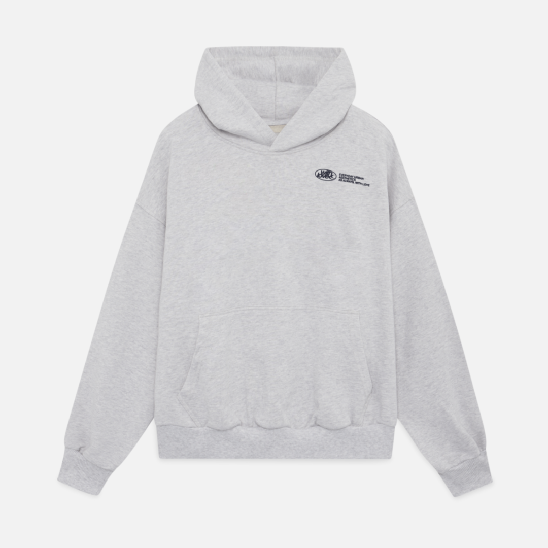 "Trendy oversized unisex hoodie, zacht grijs met capuchon en buidelzak, stijlvol en comfortabel, ideaal voor casual looks."