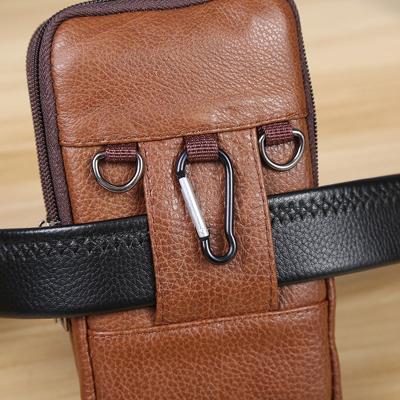 "Vintage leren heren crossbody heuptas met verstelbare band, stijlvolle bruine tas met ruime vakken en robuust ontwerp."