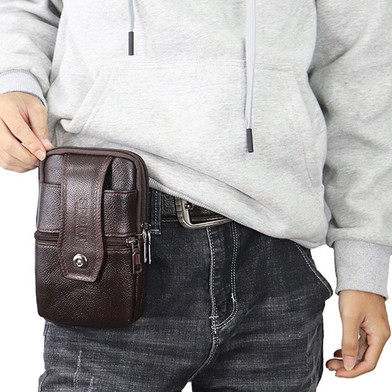 "Vintage leren heren crossbody heuptas met verstelbare band, stijlvolle bruine tas met ruime vakken en robuust ontwerp."