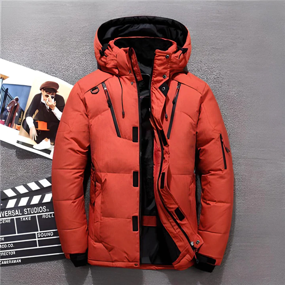"Waterdichte heren ski jas, RegularFit, oranje, gewatteerd voor warmte, ideaal voor winteravonturen."