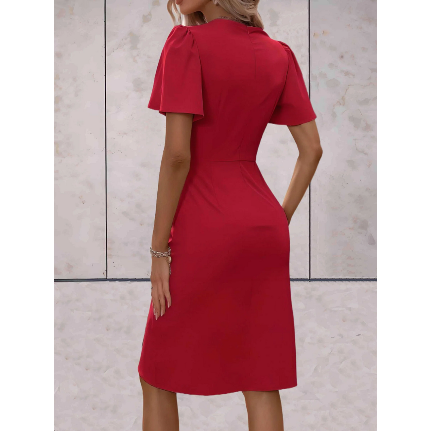 "Wikkeljurk met V-hals, flatterend ontwerp, elegante stijl voor feestelijke gelegenheden, accentueert silhouet, vloeiende mou