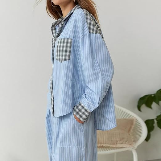 "Winterklaar dames pyjama set, vintage look, loszittend design, warme blauwe stof, comfortabel en stijlvol voor koude nachten
