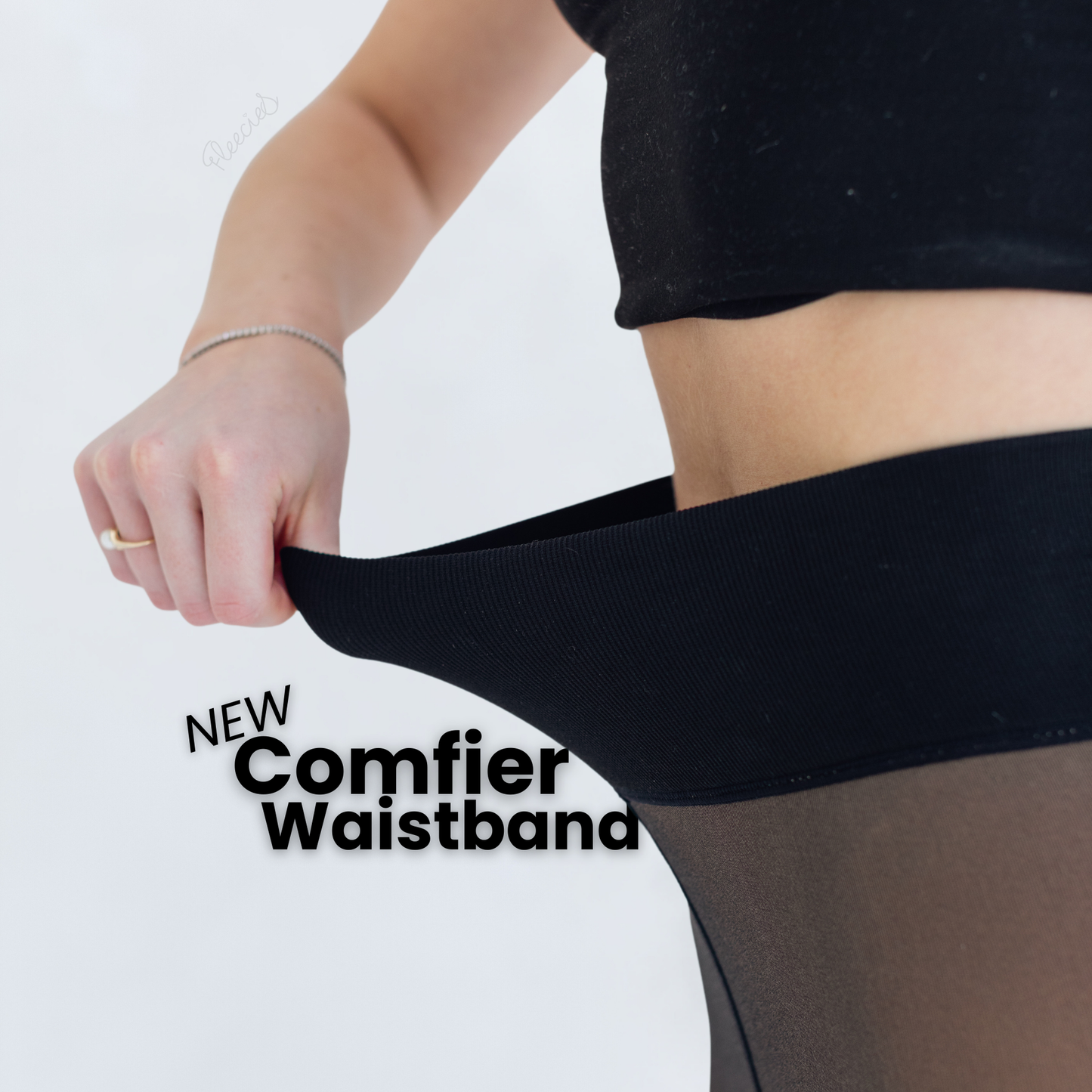 "Zwarte slimfit fleece panty met transparante look en vormend effect voor stijl en warmte in de koude maanden."