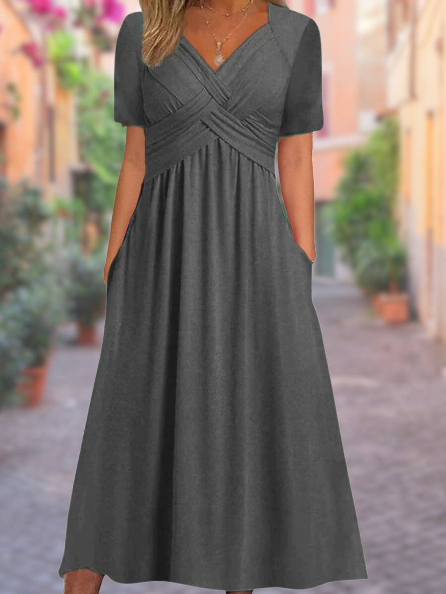 "Zwarte zomerjurk met V-hals, lichtgewicht stof, elegante details en comfortabel voor warme dagen, damesmode"
