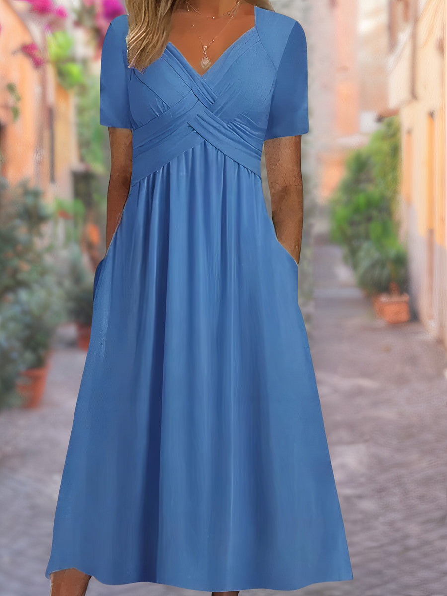 "Zwarte zomerjurk met V-hals, lichtgewicht stof, elegante details en comfortabel voor warme dagen, damesmode"