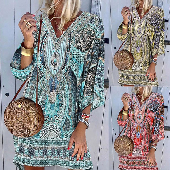 Levendige Eva™ dames zomerjurk met vrolijke, kleurrijke print; perfect voor een modieuze vakantielook.