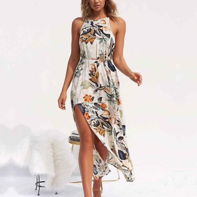 Luchtige dames maxi jurk met vrolijke bloemenprint. Comfortabele, modieuze mouwloze lente/zomerjurk.