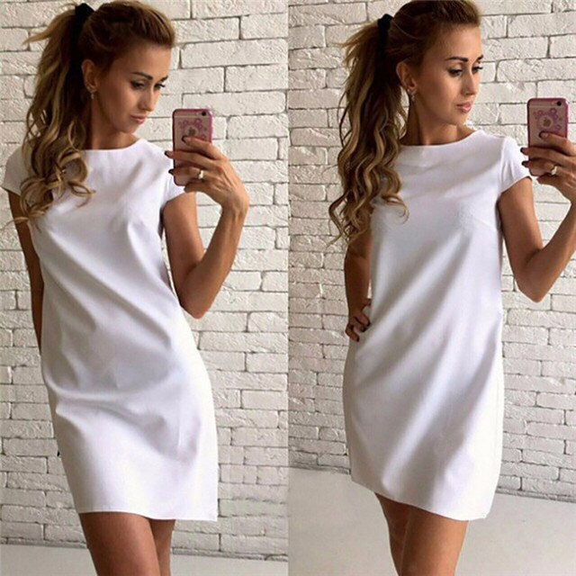 Elegante dames lentejurk Plainy. Een stijlvolle effen mini jurk met korte mouwen, ideaal voor warme dagen.