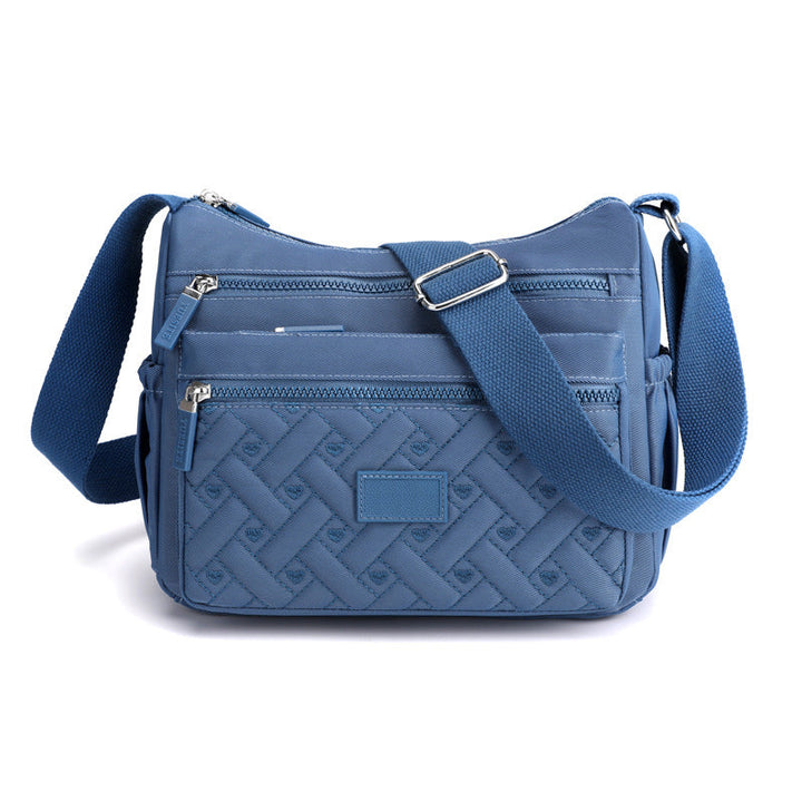 Elegante SANDSBERGORIGINALS handtas, perfect voor dames die stijl en organisatie waarderen.