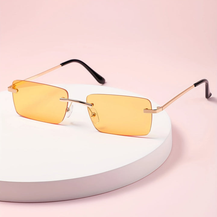 Elegante frameloze zonnebril voor mannen, perfect voor een stijlvolle en comfortabele zomer. Met UV-bescherming.
