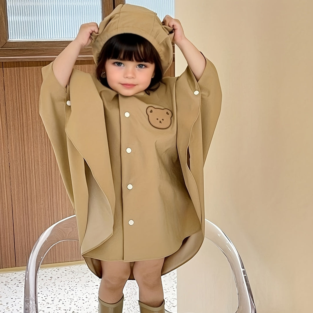 Praktische kinderregenjas met konijnendesign, waterdicht en comfortabel voor regenachtige dagen in de herfst.