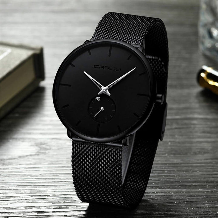 Gedetailleerd luxe heren quartz horloge, Hardlex glas en elegante band. Ideaal accessoire.