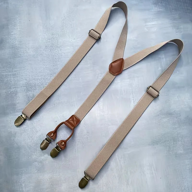 Veelzijdige en elegante heren bretels, Y-model, met verfijnde leren details en sterke metalen clips voor elke gelegenheid.