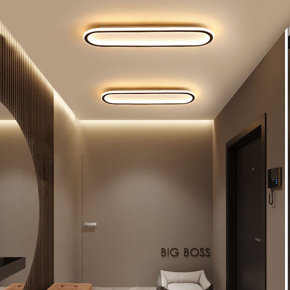 Elliptische LED plafondlamp in zwart/goud; strak design voor een moderne woonkamer. (86)