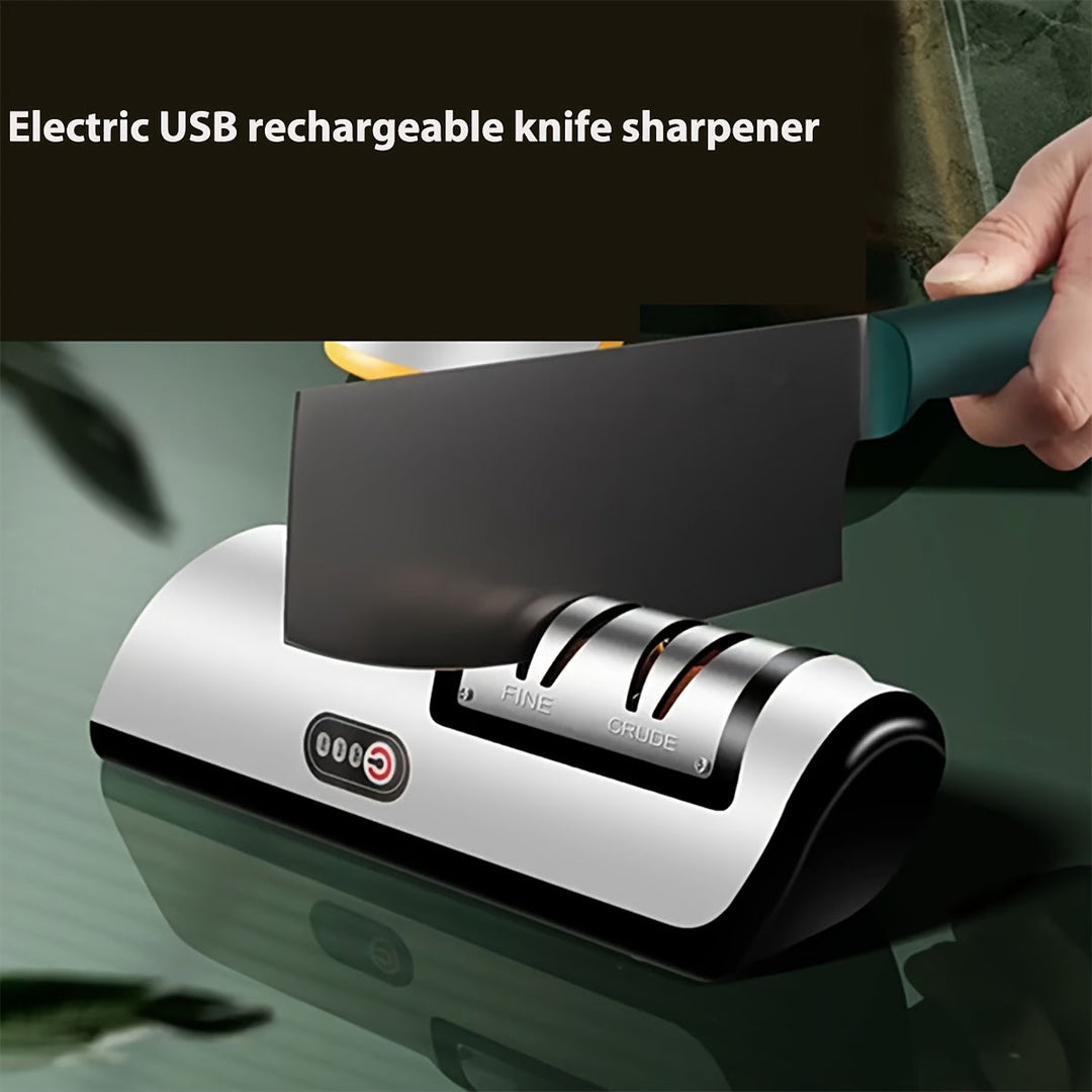 Keuken gereedschap: elektrische messenslijper die messen slijpt en via USB van stroom wordt voorzien.