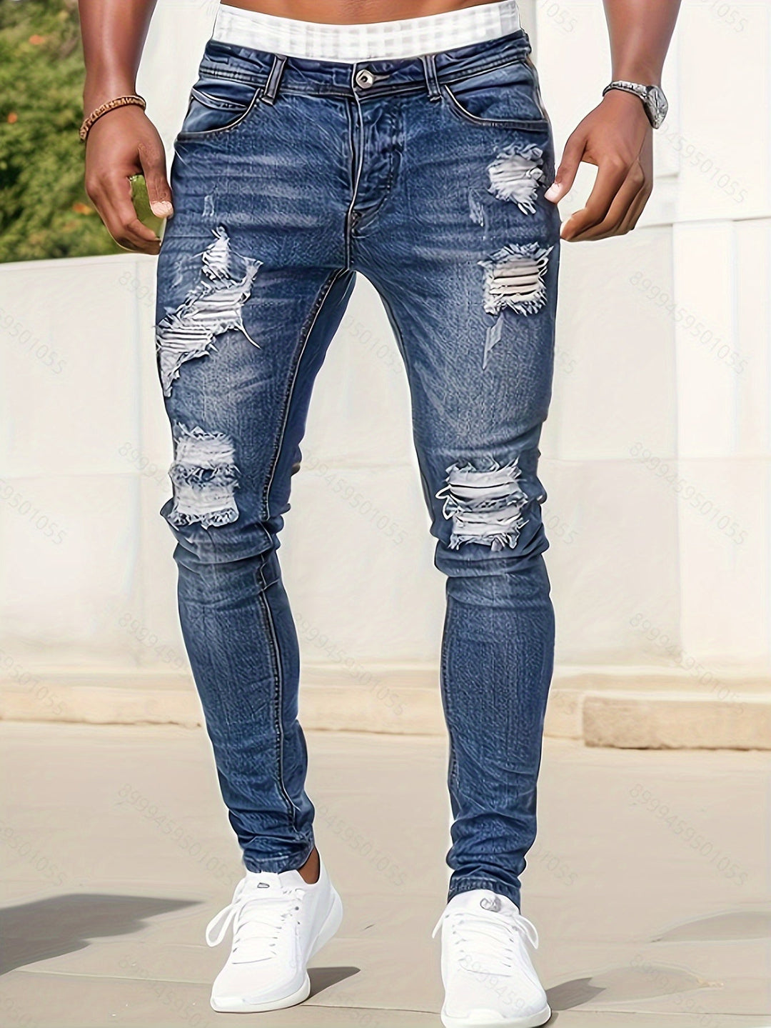 Trendy slim fit heren spijkerbroek met gescheurde look. Comfortabele stretch denim casual jeans voor mannen.