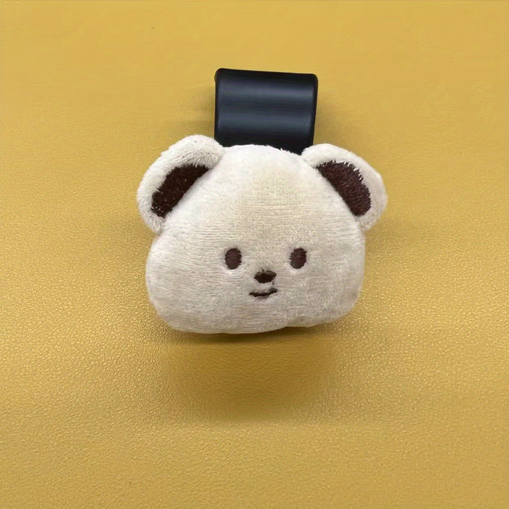 Eenvoudig te installeren autohaken aan de hoofdsteun; organiseer de achterbank met deze vrolijke berenaccessoires.