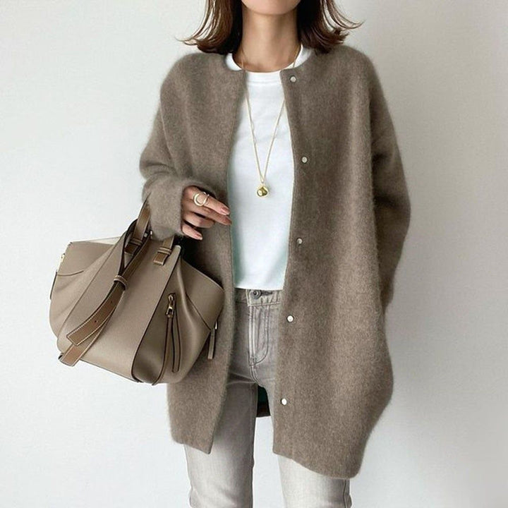 Comfortabel oversized damesvest met losse pasvorm, ideaal voor casual dagelijks gebruik. Stijlvol en veelzijdig knitwear.