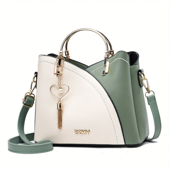 Elegante leren handtas voor vrouwen; luxe uitstraling, veelzijdige accessoire.