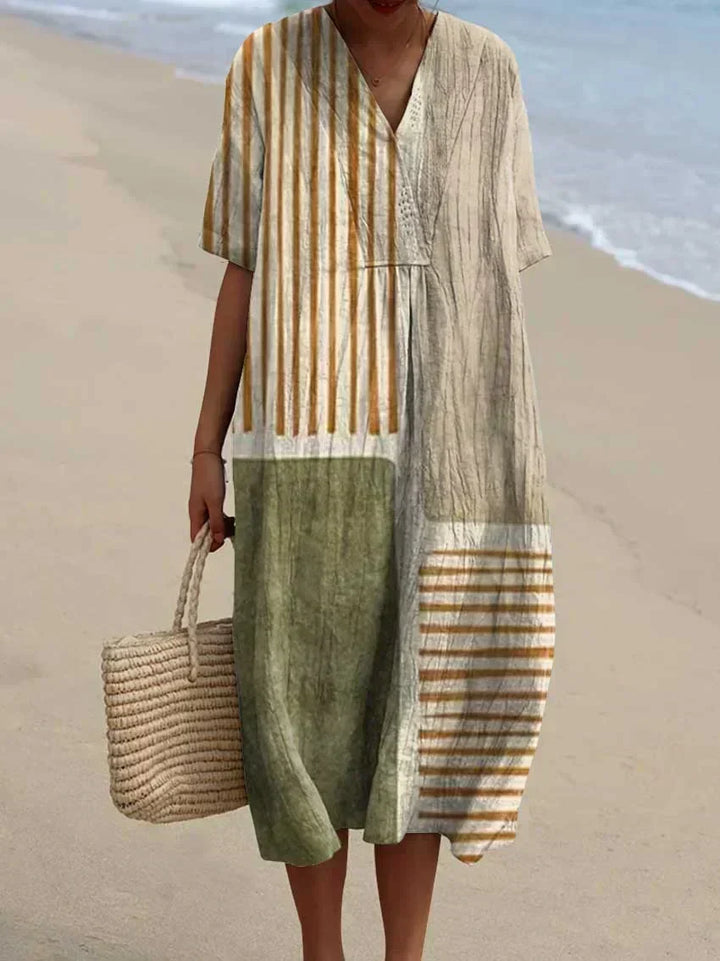 Elegante dames geruite jurk, mouwloos en midi-lengte, ideaal voor een zomerse gelegenheid.