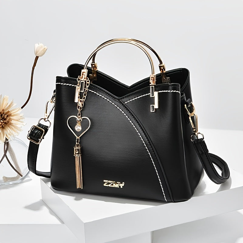 Luxe rode dames handtas van echt leer; ruim en elegant design.