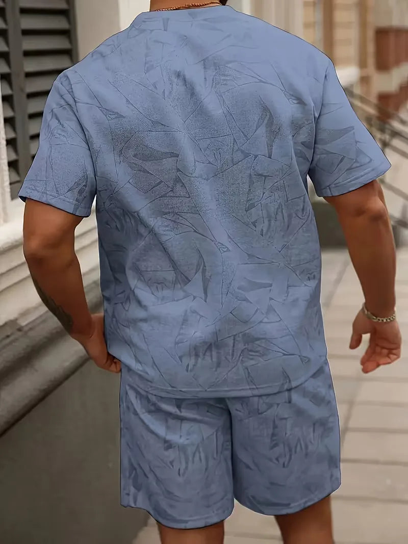 Modieuze heren zomerset met unieke abstracte print. Comfortabel t-shirt en shorts voor vakantie & vrije tijd.