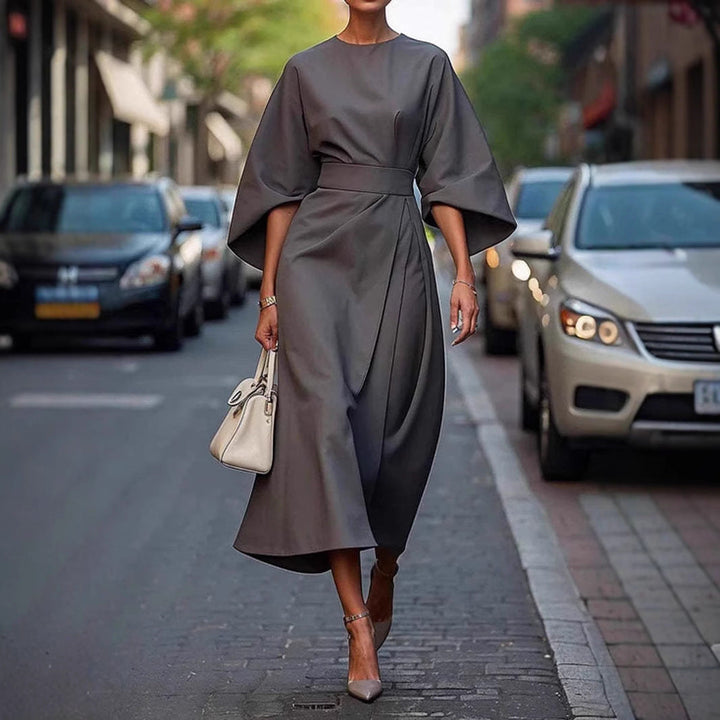 Casual zomerjurk CJ26 voor dames, elegant met losse mouwen en tailleaccent, een comfortabele en modieuze keuze.