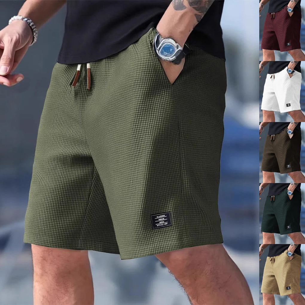 Heren casual sportshorts met trekkoord en praktische zakken, ideaal voor zomer en dagelijks gebruik.