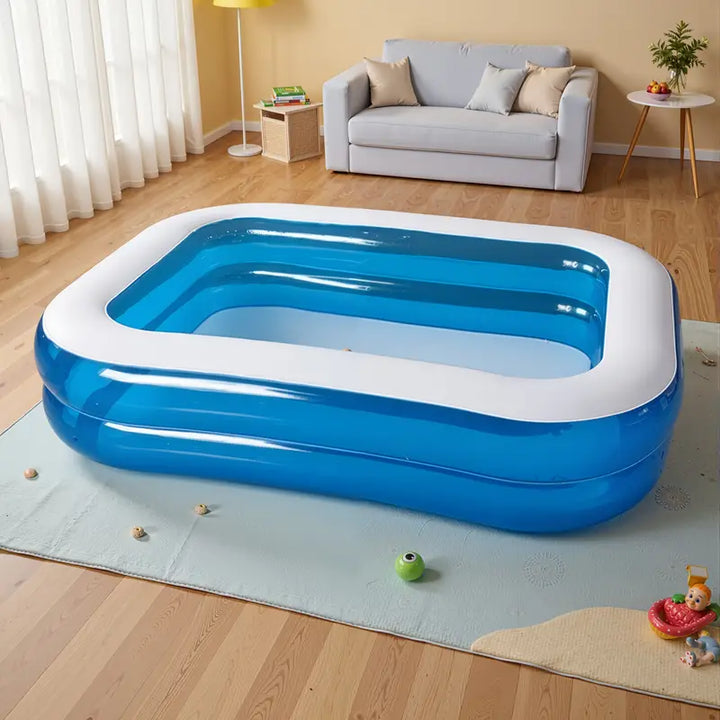 Opgezet kinderzwembad / familiezwembad in de tuin, klaar voor uren waterplezier voor 4 personen.