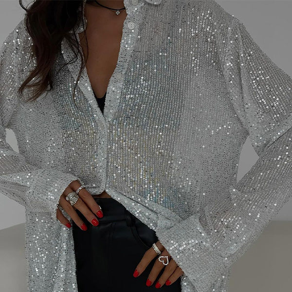 Dames sprankelende pailletten blouse Celeste, losse pasvorm, perfect voor een chique avond uit.
