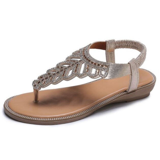Stijlvolle platte sandalen voor dames, met strass detail; comfortabele en elegante zomerschoen.