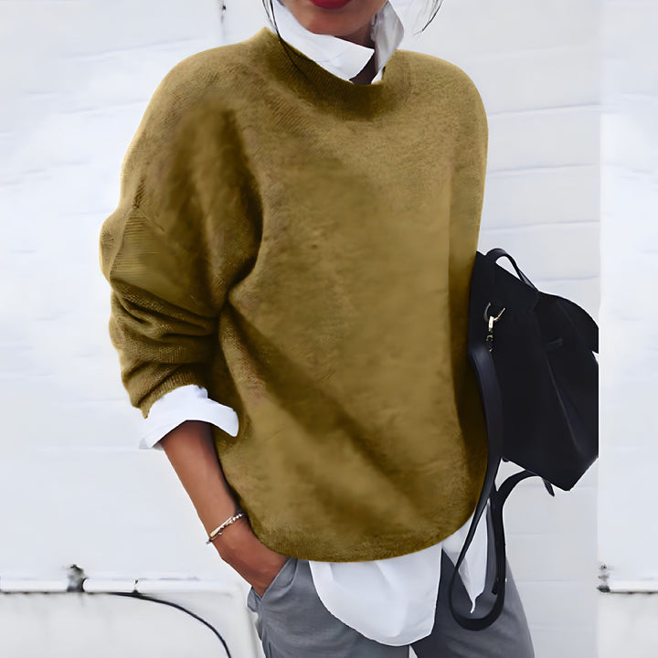 Stijlvolle gebreide dames trui, comfortabel en zacht, een essentieel item voor winter- en herfstmode.