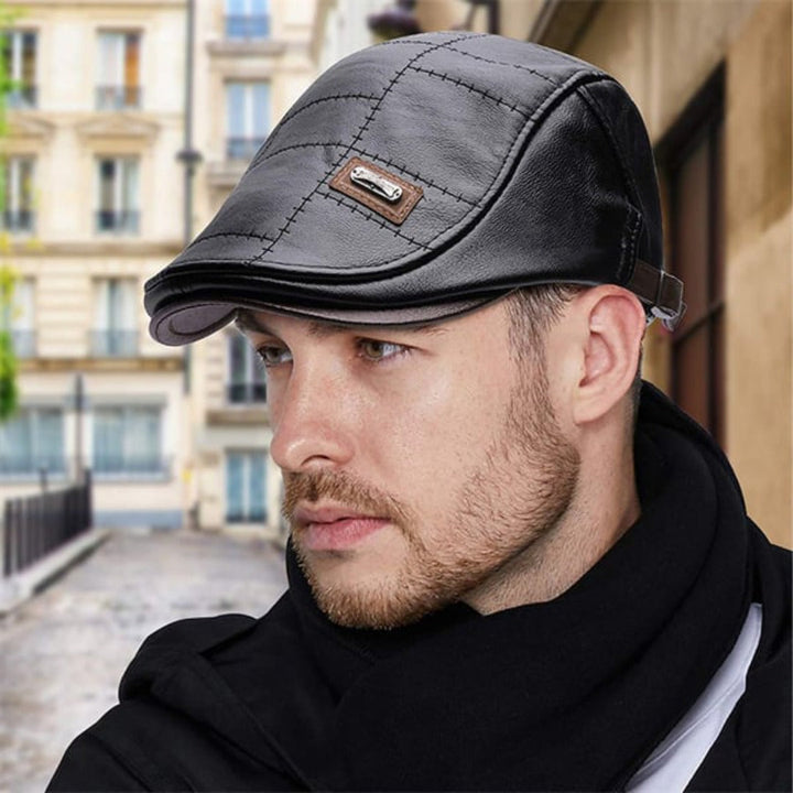 Zwarte heren retro baret. Stijlvolle klassieke hoed voor een tijdloze herenmode look.