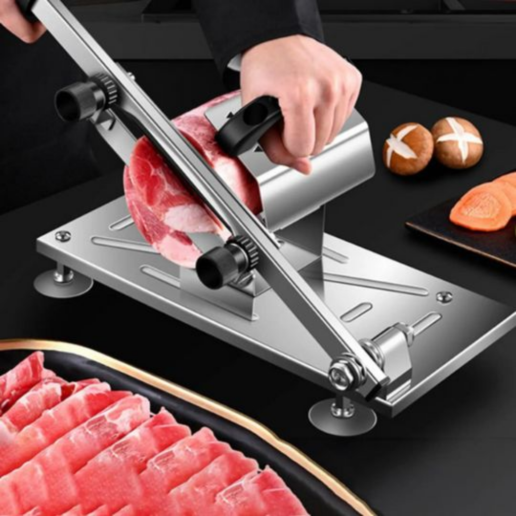 Compacte elektrische snijmachine voor nauwkeurig snijden van vlees, kaas en brood in de thuiskeuken. Efficiënt keukenapparaat.